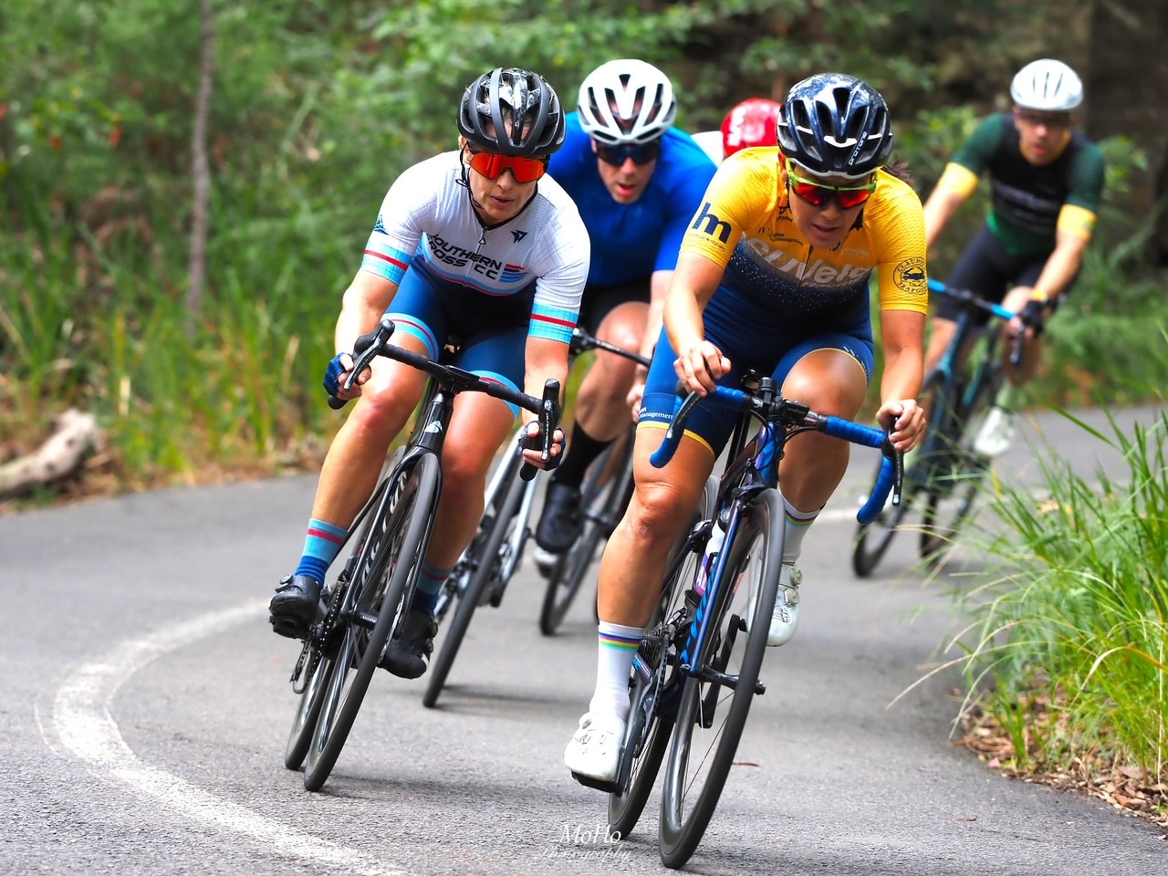 Cyclists racing on a country road